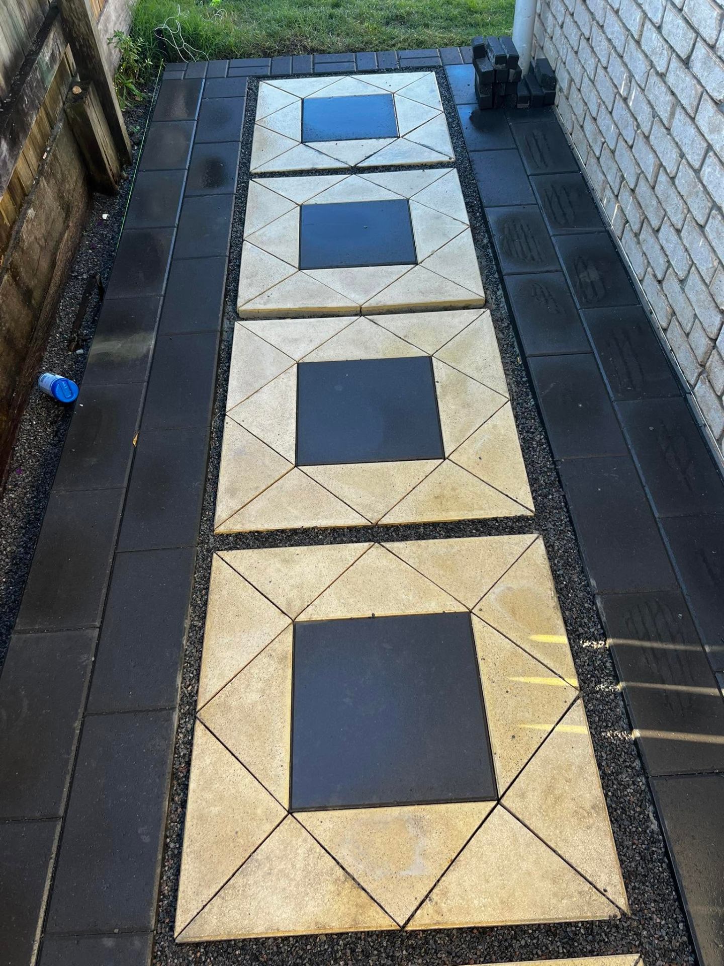 Diamond-pattern paver path with charcoal border